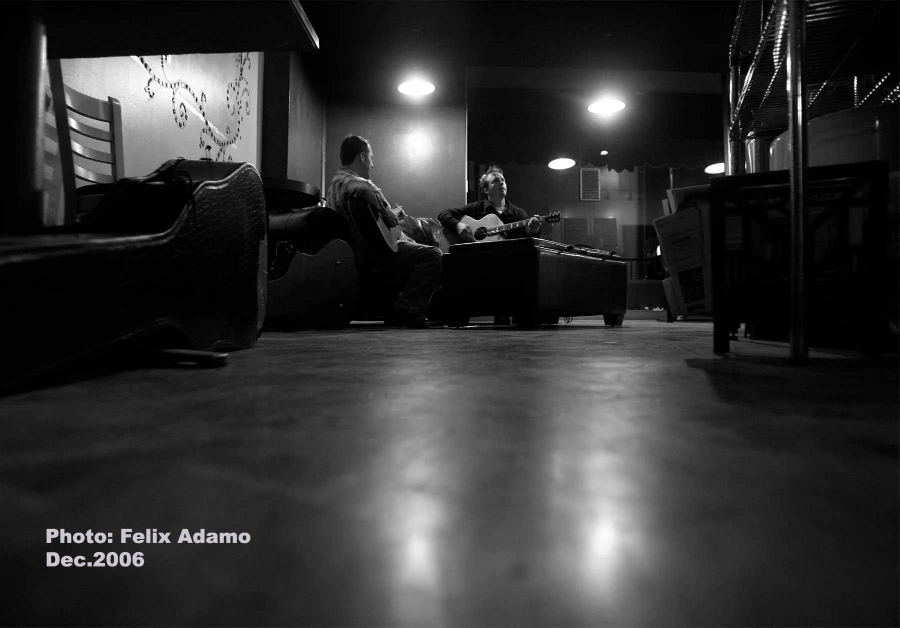 Two musicians playing guitars after hours at Dagny's in 2006