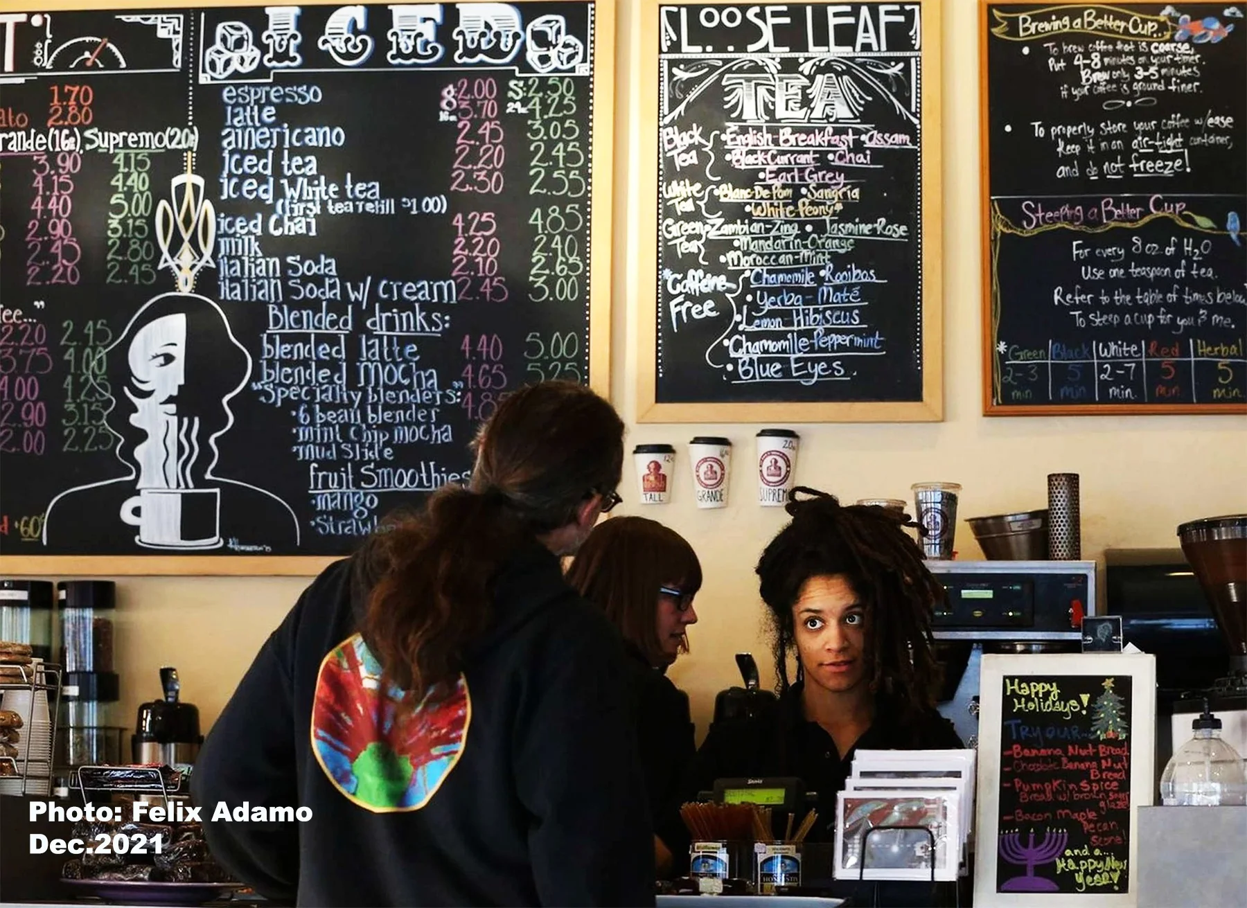Customers and a barista at the Dagny's counter in 2021